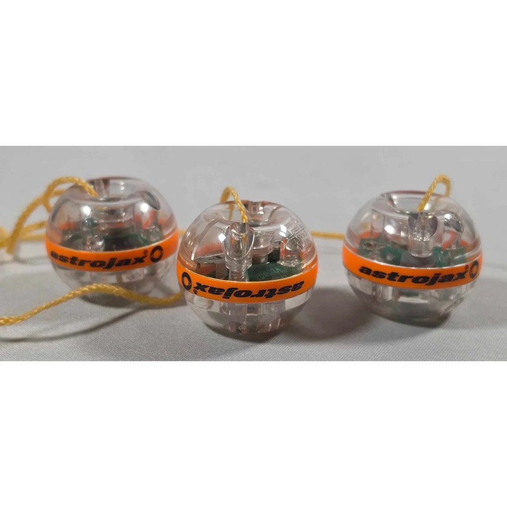 VTG 2003 Astrojax SATURN Dancing With Light Skill Toy Y2K Orange